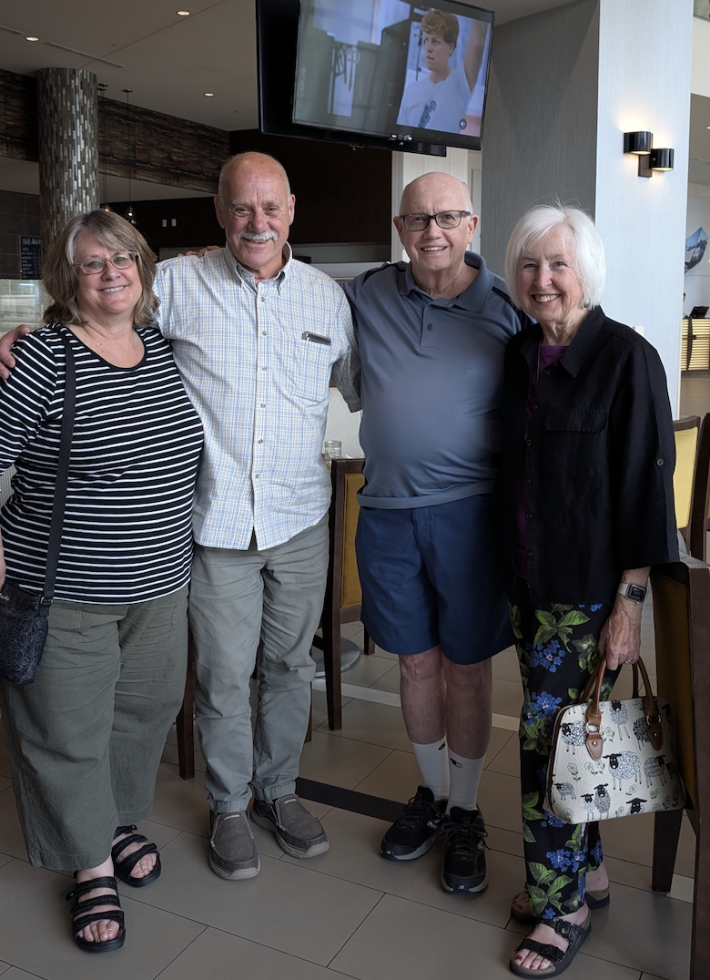 Two men named Murray Lundberg, with their wives Cathy and Eileen, in Calgary.