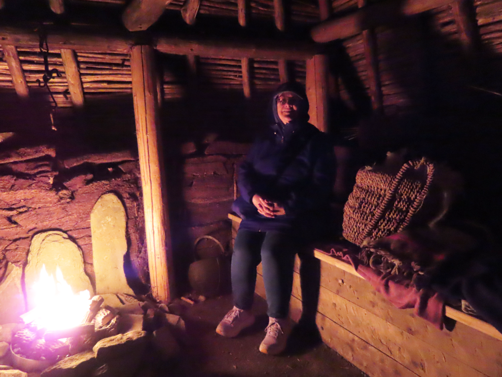 Cathy Dyson warming up by the fire at L'Anse aux Meadows National Historic Site, Newfoundland.