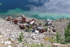 Cars run off the cliff at the Little Chief copper mine pit at Whitehorse.