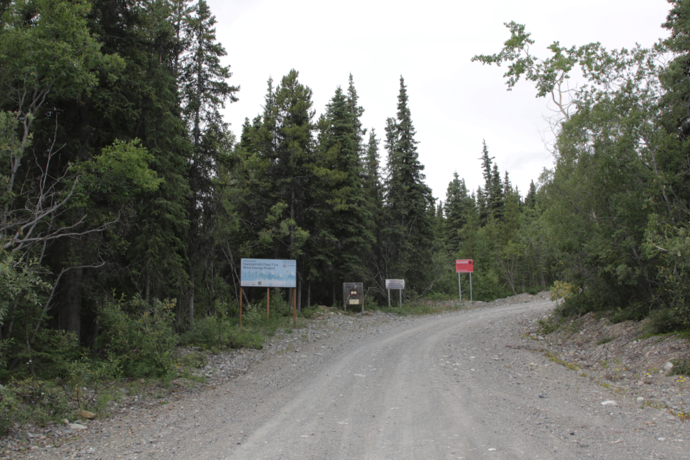 Four signs mark the start of the serious climb on the Haeckel Tower Road at Whitehorse.